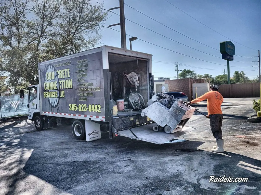 Unloading The Slab Saw To Cut Trenches At Burger King.